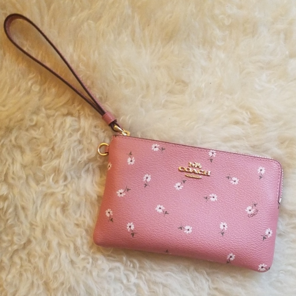 Pink flower Coach wristlet